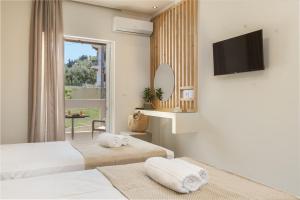 Letto o letti in una camera di Andelice Zante