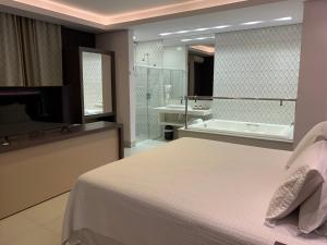 Um banheiro em Grand Carimã Resort & Convention Center