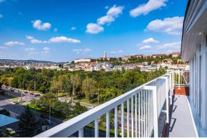 a balcony with a view of a city at Christina Residence in Budapest
