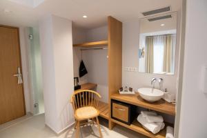 A television and/or entertainment centre at Dimani Suites