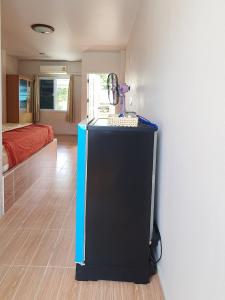 TV a/nebo společenská místnost v ubytování Sairee Center Guest House