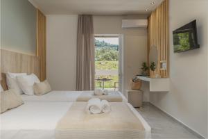 Letto o letti in una camera di Andelice Zante