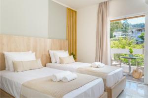 Letto o letti in una camera di Andelice Zante