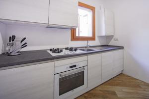 Kuchyňa alebo kuchynka v ubytovaní CEFAS Apartments