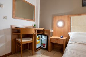 Postel nebo postele na pokoji v ubytování Amadei Hotel Figaro & Apartments