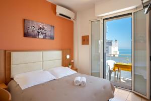 Imagen de la galería de Amadei Hotel Figaro & Apartments, en Pesaro