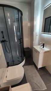 Kúpeľňa v ubytovaní Apartments Mikas