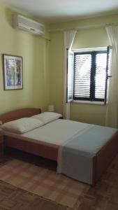 Posteľ alebo postele v izbe v ubytovaní Apartment Dalma