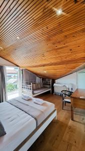 A bed or beds in a room at Villa Atlas Még 37 kép