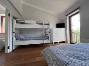 Postel nebo postele na pokoji v ubytování Apartmán HYGGE Bratrouchov