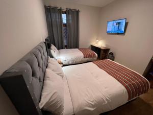 Postel nebo postele na pokoji v ubytování Casona Plaza Hotel Cusco