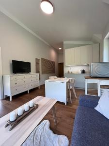 Kuchyň nebo kuchyňský kout v ubytování Apartmán HYGGE Bratrouchov