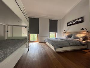 Postel nebo postele na pokoji v ubytování Apartmán HYGGE Bratrouchov