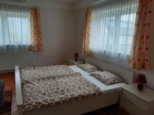 Postel nebo postele na pokoji v ubytování Ferienwohnung Haus Graf
