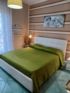 Posteľ alebo postele v izbe v ubytovaní B&B Casa vacanze Cilentami