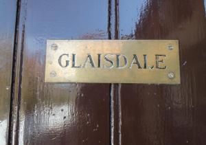 a sign on a door that says glazedale at Glaisdale in Whitby