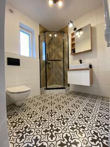 Afbeelding uit fotogalerij van Cute house in Kretowiny