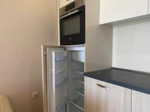 A kitchen or kitchenette at PARADISO 'В' 102 PRIVATE SEA VIEW Apartment