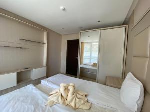 A bed or beds in a room at PARADISO 'В' 102 PRIVATE SEA VIEW Apartment