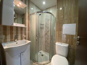 A bathroom at PARADISO 'В' 102 PRIVATE SEA VIEW Apartment