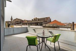 En balkon eller terrasse på Art City Villa
