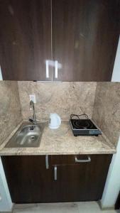 Kuchyň nebo kuchyňský kout v ubytování Apartmán Podhájska