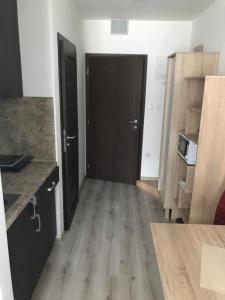 Kuchyň nebo kuchyňský kout v ubytování Apartmán Podhájska