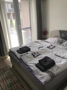 Postel nebo postele na pokoji v ubytování Apartmán Podhájska