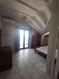 Posteľ alebo postele v izbe v ubytovaní Villa Lithitsa