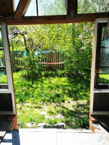 Ogród w obiekcie Mazurskie Klimaty - niezależny, ogrodzony dom