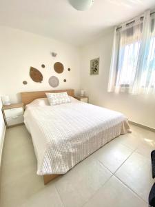 Postel nebo postele na pokoji v ubytování Villa Elea