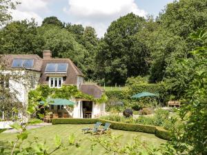 an image of a house with a garden at Valley House in Devizes