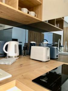 Kuchyň nebo kuchyňský kout v ubytování Apartmani CUBE L