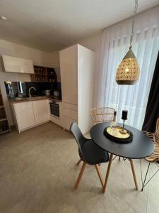 Kuchyň nebo kuchyňský kout v ubytování Apartmani CUBE L