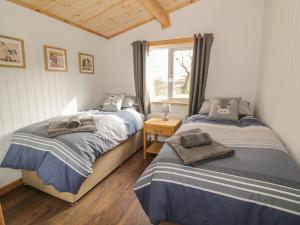 מיטה או מיטות בחדר ב-Top Style Orchard