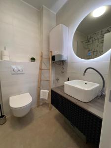 Koupelna v ubytování Apartmani CUBE L