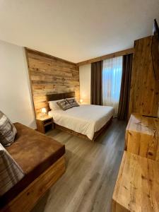Postel nebo postele na pokoji v ubytování Hotel Da Franco e Adriana
