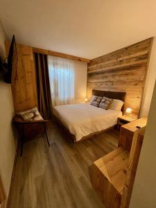 Postel nebo postele na pokoji v ubytování Hotel Da Franco e Adriana