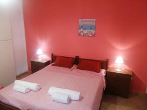 Posteľ alebo postele v izbe v ubytovaní Lampedusa House