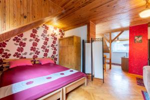 a bedroom with a large bed in a room at Apartamenty pod Kotwicą in Ustka