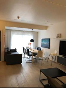 En sittgrupp på City Center Oslo- Venice Apartment Sea Side Three-Bedrooms and Two Toilettes