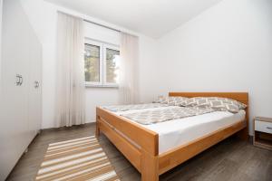 Posteľ alebo postele v izbe v ubytovaní Apartment Don Vito