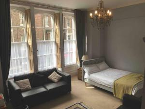 Postel nebo postele na pokoji v ubytování Abbotts Mews Apartment York City Centre