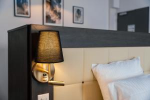 Posteľ alebo postele v izbe v ubytovaní Cottages de France CDG