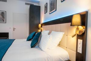 Posteľ alebo postele v izbe v ubytovaní Cottages de France CDG