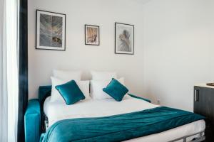 Posteľ alebo postele v izbe v ubytovaní Cottages de France CDG
