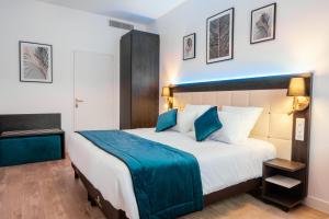 Posteľ alebo postele v izbe v ubytovaní Cottages de France CDG