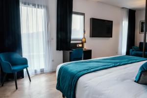 Posteľ alebo postele v izbe v ubytovaní Cottages de France CDG
