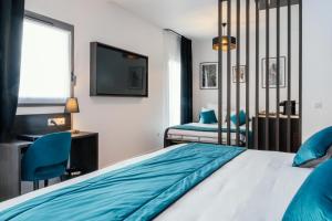 Posteľ alebo postele v izbe v ubytovaní Cottages de France CDG
