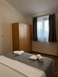 Postel nebo postele na pokoji v ubytování Villa Marija Novalja
